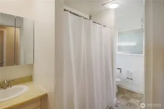 Functional full bath with classic style, conveniently located near all bedrooms.