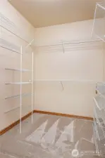 Primary bedroom walk-in closet.