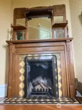 Decorative fireplace in the den/office.