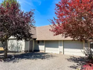 Generous two car garage. Double door area to the left has been converted to shop/studio space.