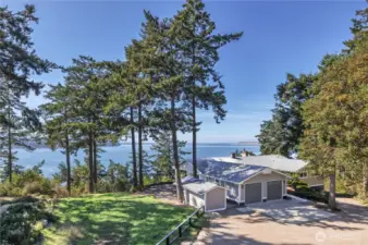 Extra lot in the foreground with a view easement—perfect for gardening, pets, or simply enjoying the open space.