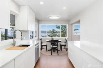 Beautiful views out every window in the kitchen. The cabinet hardware has been installed since this photo was taken.