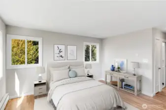 The primary bedroom bath and closets are off to the right in this photo.