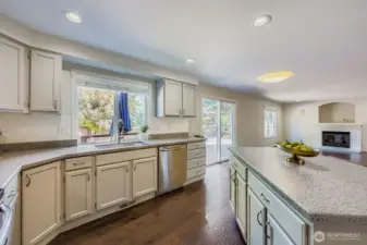 Kitchen enjoys direct access to large deck and back yard through slider.