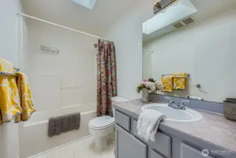 Upper level secondary full bathroom.