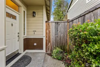 Main front door entrance is on the side of the house.