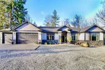 Room for parking all your toys. Three car connected garage in addition to detached shop not pictured here.