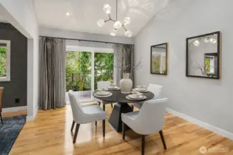 Dining area overlooks the backyard