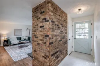 Beautiful fireplace brickwork exposed on 3 sides.