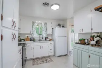 New Duralux flooring, laminate counters, crisply painted cabinetry.