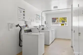 Two washers and two dryers connect to an app so you can monitor your laundry status from upstairs!