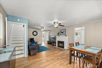 Stairs to the left lead to 2 bedrooms upstairs