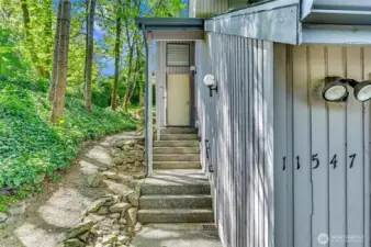 Welcome to your end unit town house surrounded by lush greenery, a private garage, and private entry. This two story duplex style town house walks and feels like a single family residence.