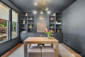 Large main floor office/bedroom w/custom built-ins, large closet & floor outlet