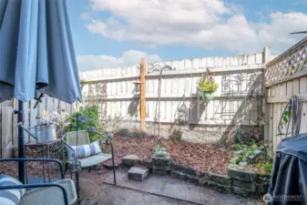 Backs to open grass area: Enjoy privacy and greenery with direct access to a peaceful open lawn behind the home.