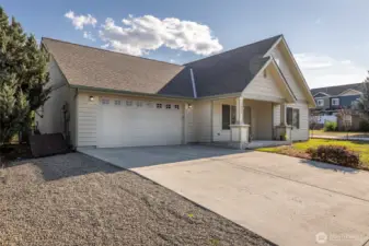 Two car garage, driveway parking, and street parking