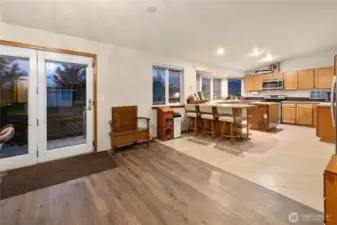 Open Kitchen and dining with updated flooring.