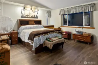 Primary bedroom with large en-suite bathroom