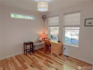 Third bedroom showcasing the striking hickory flooring!