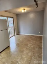 Dining room has a sliding glass door to the deck for bar-b-ques