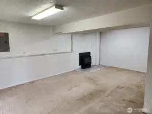 Rec-room with an insert fireplace!