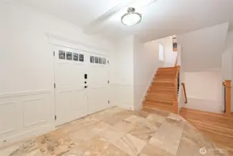 This home is unmatched in utility flexibility as it has 3 kitchens, 3 laundry sets and separate entrances.