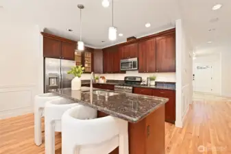 The kitchen has bar seating.