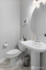 Main floor half bath for guests.