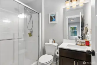 Private full bath attached to lower level 3rd bedroom.