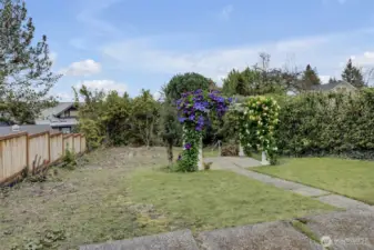 Back yard with gazebo.  2-car garage below on alley.