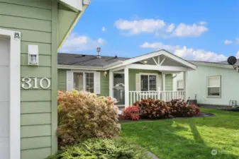 Great curb appeal, and those hydrangea bushes really bloom in the right season.