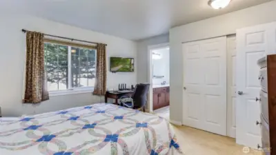 The primary bedroom has 2 sliding door closets and a updated full bath.