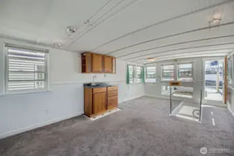 Huge Bonus room on the upper level with a covered BBQ and entertaining deck year round or head out onto two levels of rooftop decks.