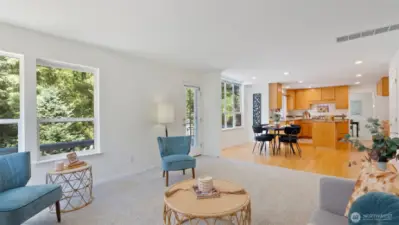 It’s easy to stay connected in this wing of the home, whether you’re relaxing inside or stepping out to the deck to join the conversation.