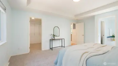 Like every closet in the home, the shelving was carefully removed for repainting, then meticulously reinstalled. Pocket doors provide a stylish separation to the primary bath.