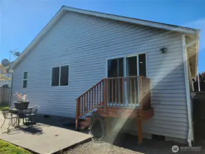 Back deck off kitchen slider to porch and yard.