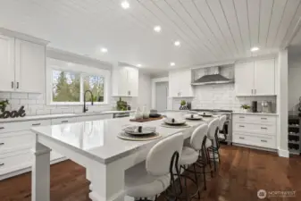 Updated chefs kitchen with stainless steel appliances and extra large center island