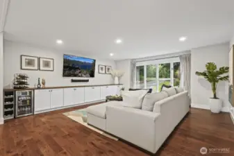 Family room with built in storage and beverage cooler