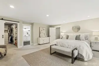 Another view of the primary bedroom