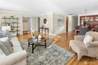 The living room extends into the large dining room for flexibility in entertaining.