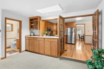 A large pass-through between the kitchen and family rooms combined with a long buffet line will make Seahawks gathering so much easier.