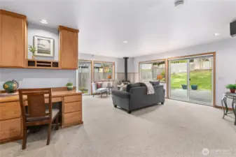 The built-in desk in the family room is great space for working at home or as a homework center.