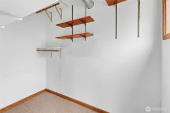 Fantastic walk-in closet located off the family room.