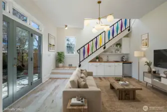 VIRTUALLY STAGED- Wanted to show how this space was set up before. It had a cabinet with a fridge and a few small kitchen things. You could make the back space into a 3rd rental and have a tri-plex! It has its own entrance.