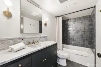 Full bathroom with Waterworks faucets.