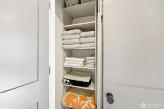 Hallway storage/linen closet.
