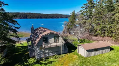The 2582 sf cabin comfortably hosts your crew, with two bedrooms, two full bathrooms, a large bonus room, and a spacious daylight basement, plus a handy garage for all your island gear, from the crab pots to the kayaks and paddle boards