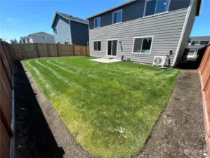 Fully landscaped and fenced back yard