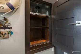 A Dumbwaiter whisks groceries up stairs and the space is large enough by design to install an elevator.