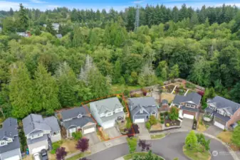 Note acres of woods, incorporating natural drainage systems, providing habitat and even trails for you in the near by Cooper Crest park. Lovely protected, private space.